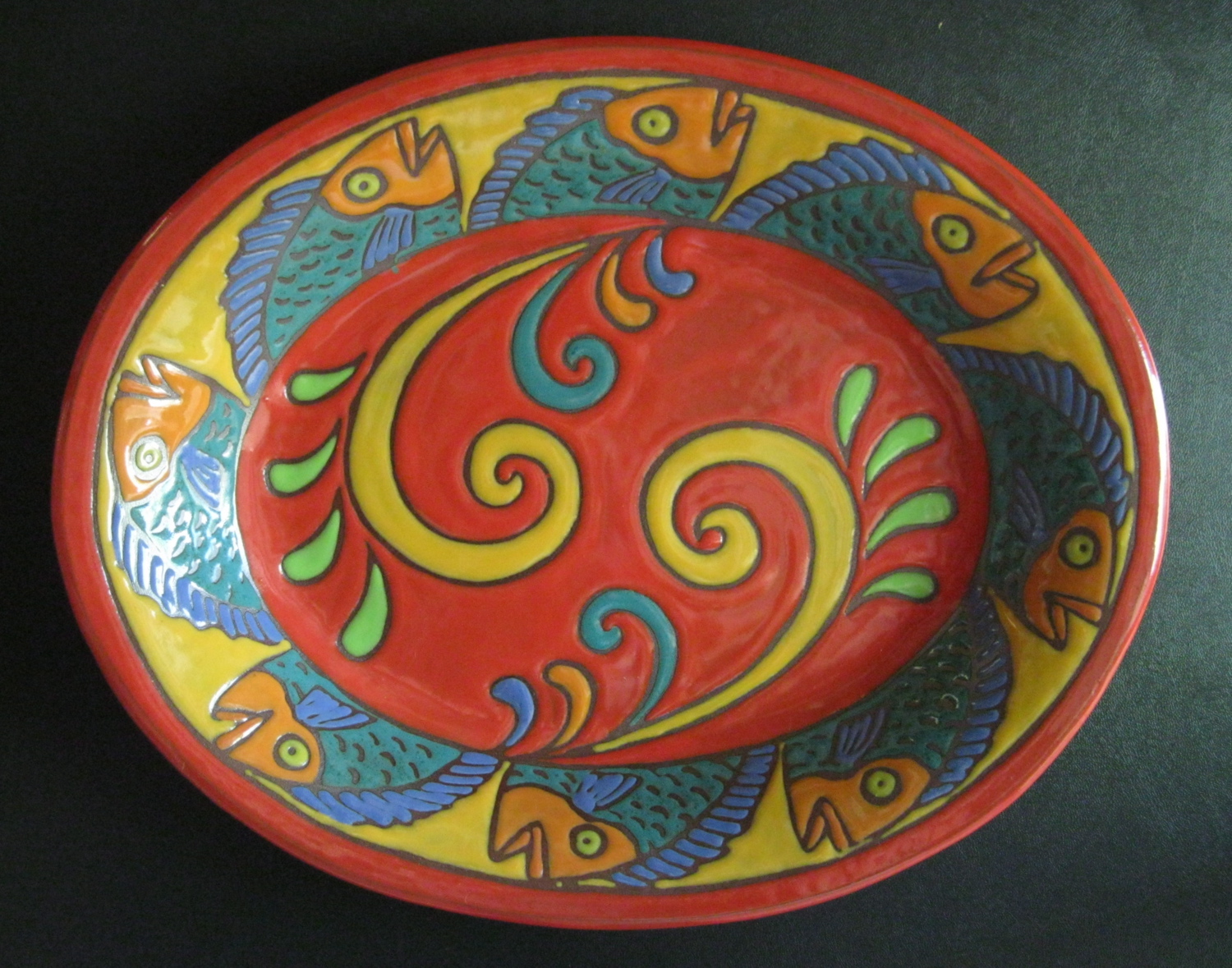 Red and Yellow Oval Serving Dish with Cuerda Seca Fish Design