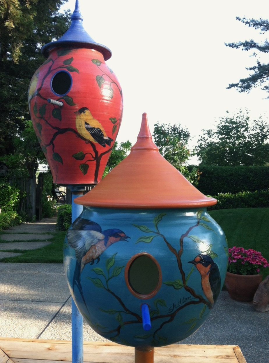 Colorful Ceramic Birdhouses with Goldfinch and Swallow Designs