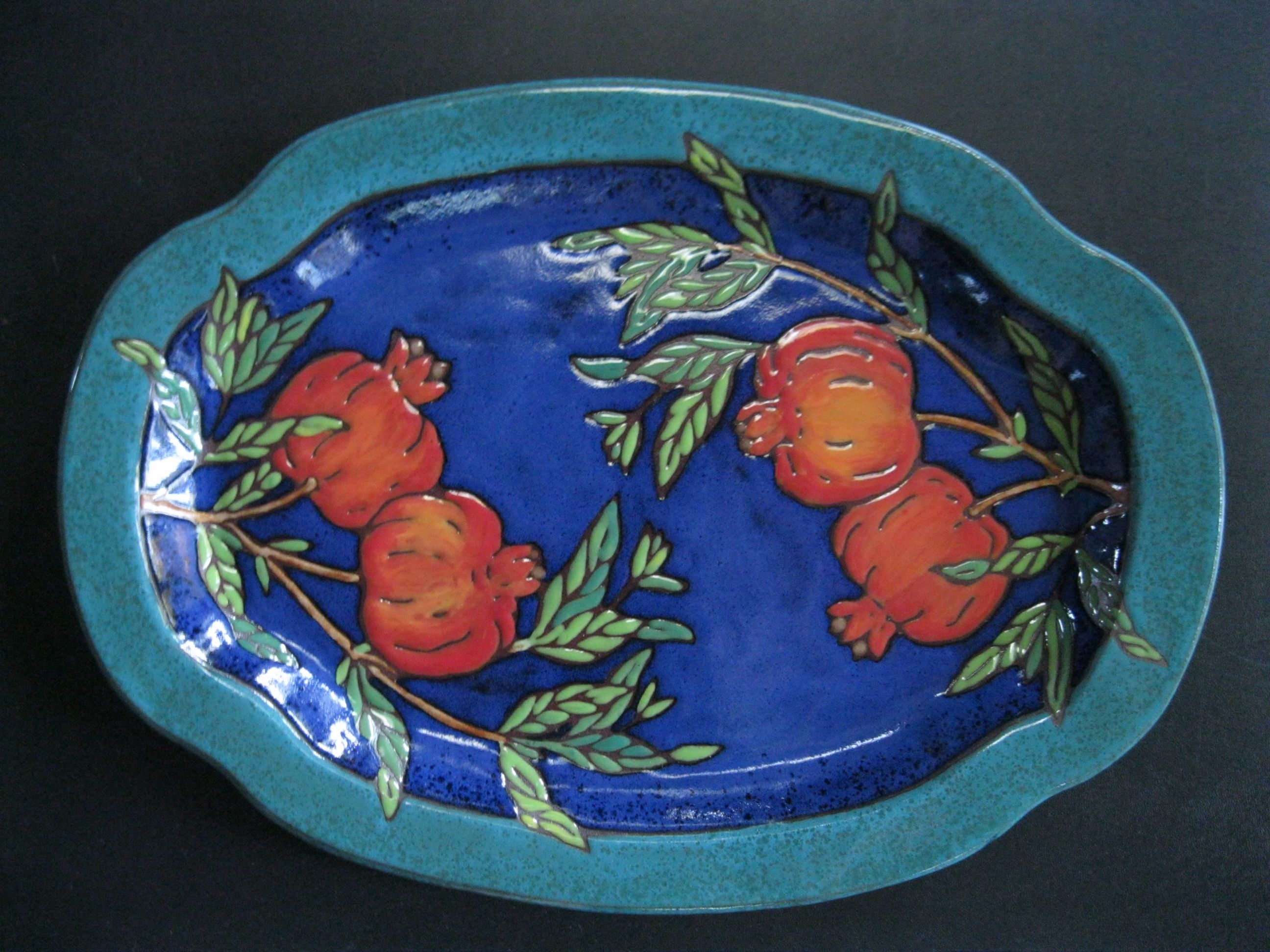 Serving platter in cobalt blue and turquoise with pomegranate motif