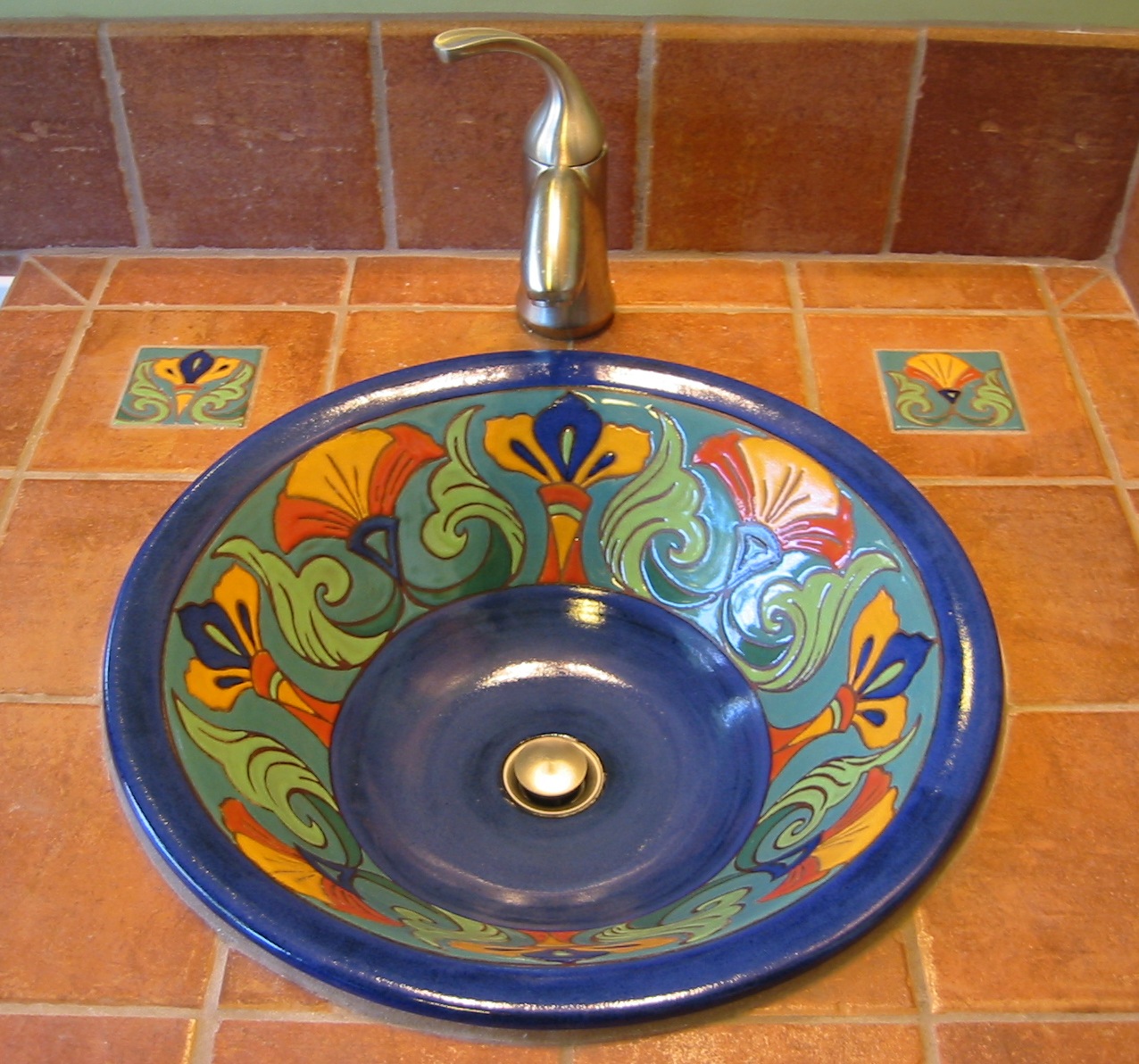 Cobalt Bule Sink with Cuerda Seca Design Set in California Tile Bathroom