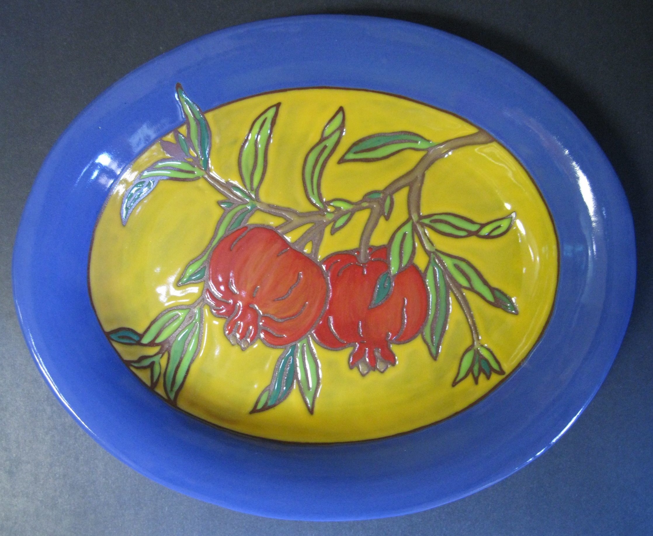 Blue and Yellow Platter with Cuerda Seca Pomegranate Motif