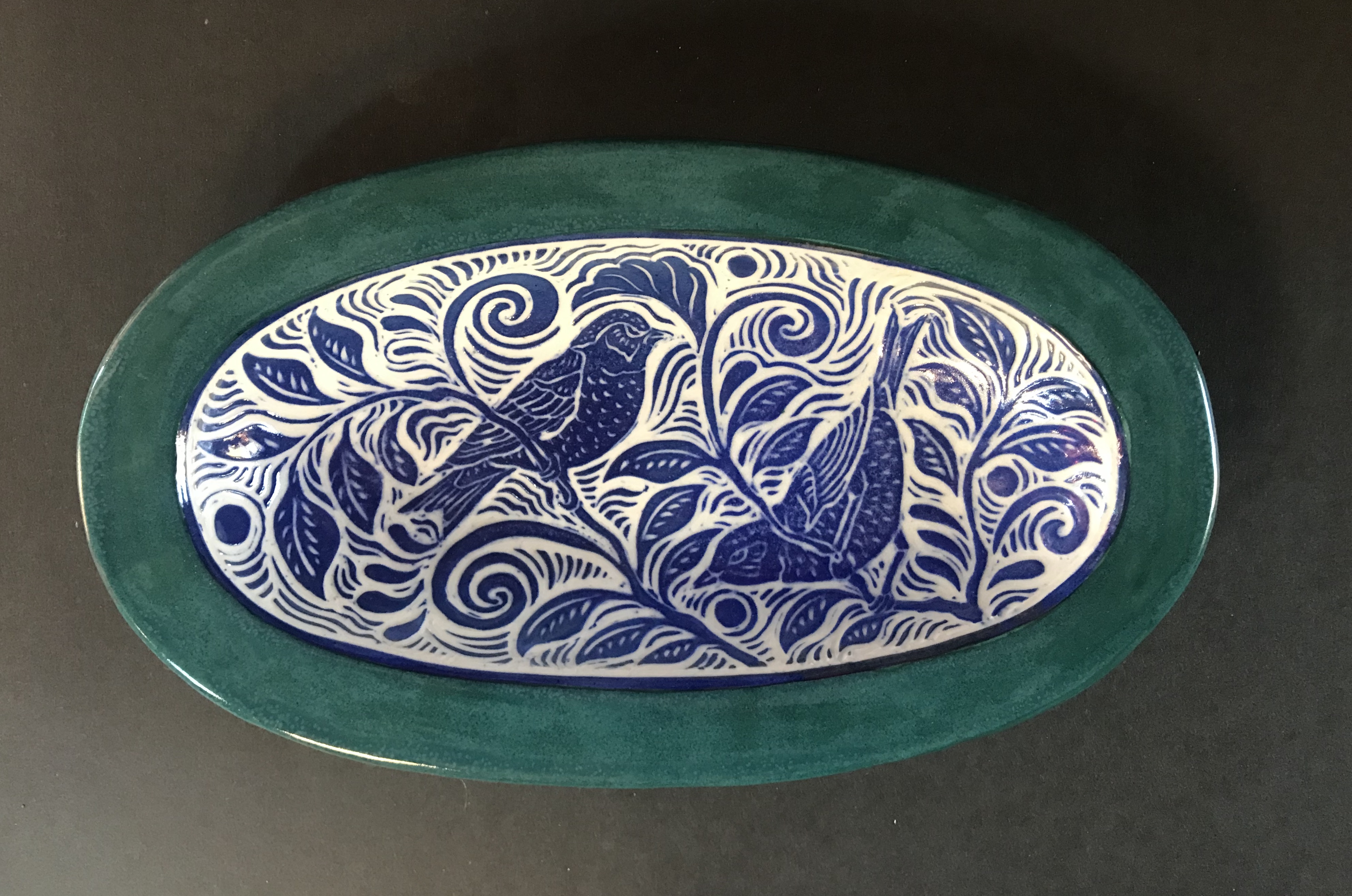 Ceramic Oval Serving Dish in Cobalt Blue, White, and Turquoise with Stylized Warbler Desgin